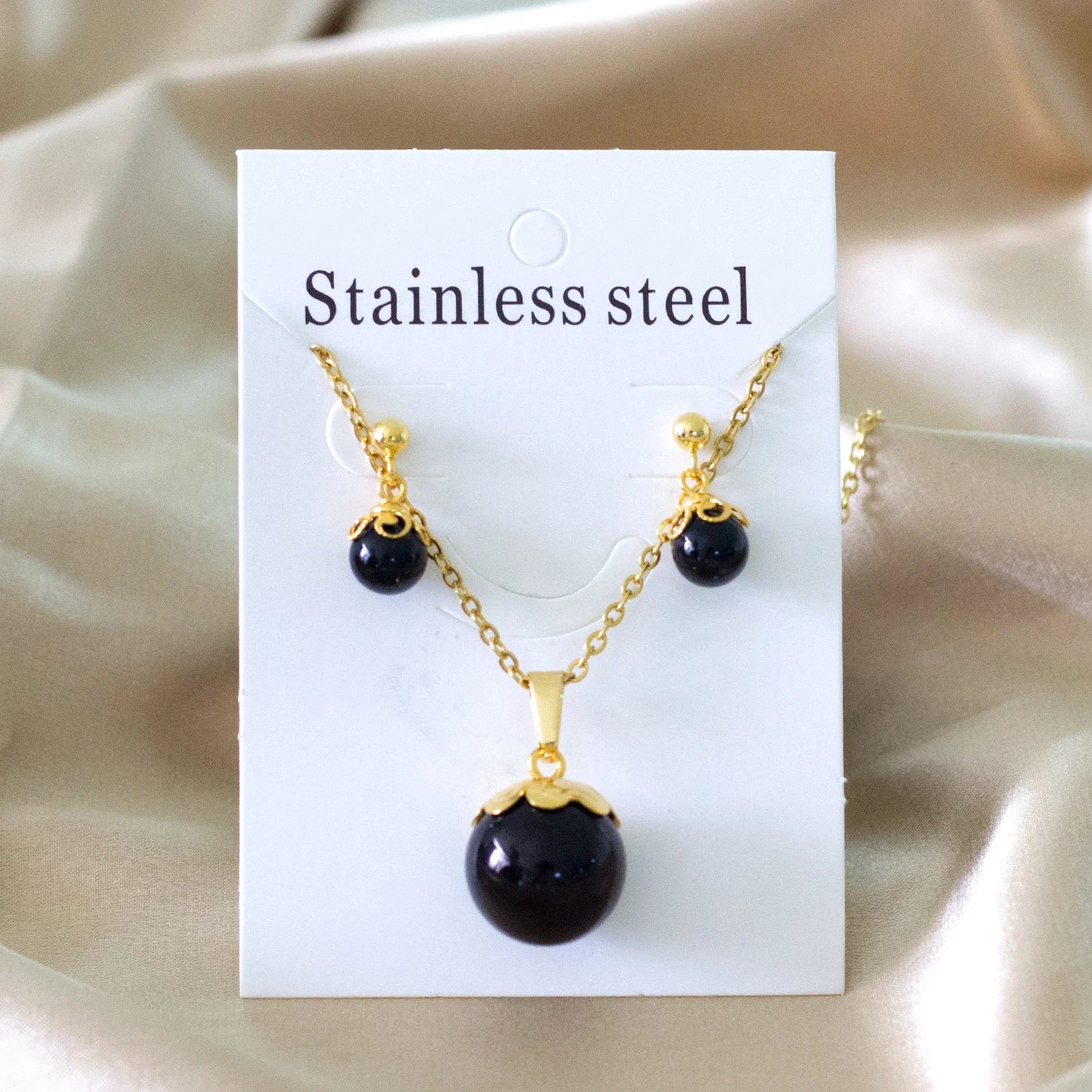 Classy Stainless Steel - ensemble collier et boucles d'oreilles en acier inoxydable